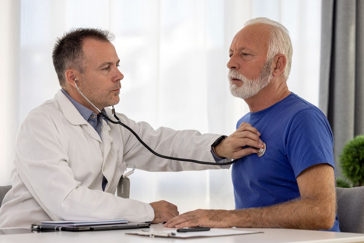 Cardiologist listening to patient's heart | Image credit: Space_Cat – stock.adobe.com