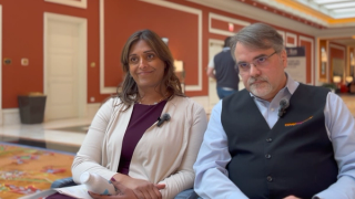 H. John Beardsley, MBA, and Fauzea Hussain, MPH, sitting for a video interview