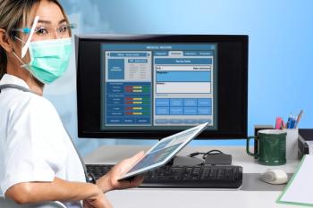 Doctor looking at electronic health record on screen | Image credit: pandpstock001 – stock.adobe.com