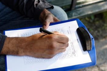 person filling out form