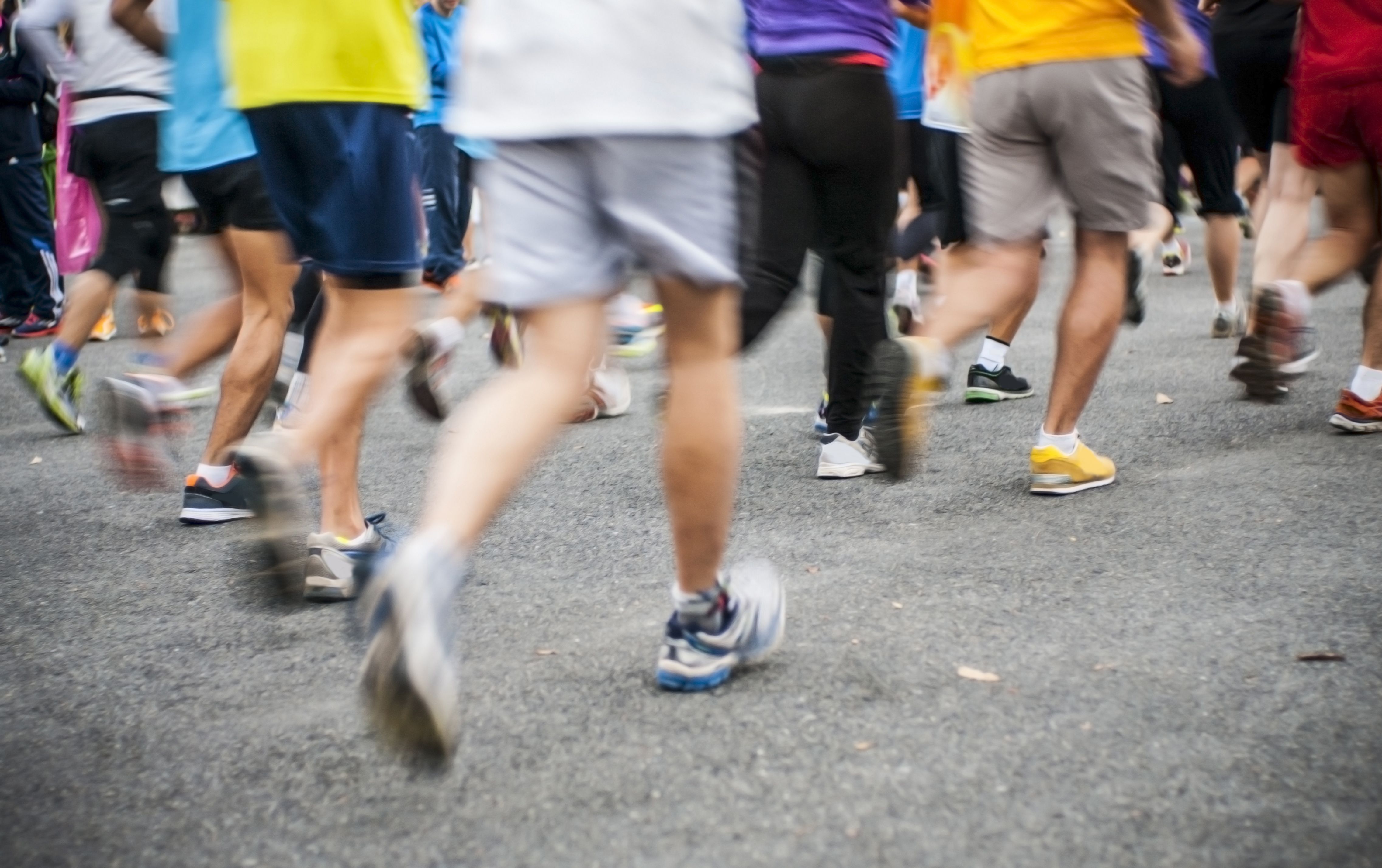 Crowd of people running.