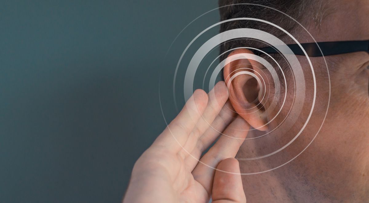 Person cupping ear to hear better | Image credit: steph photographies - stock.adobe.com