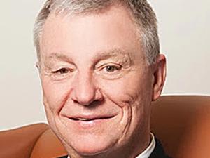 J. Thomas “Tommy” May