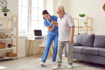 Nurse helping man exercise | Image credit: Studio Romantic - stock.adobe.com