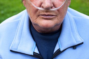 man with breathing device