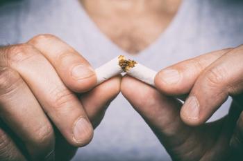 man breaking cigarette in half | Image Credit: mbruxelle - stock.adobe.com