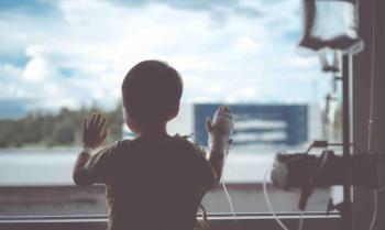 Child in hospital looking out window | Image credit: MIA Studio - stock.adobe.com