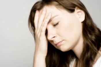 Woman With a Migraine