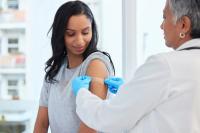 Woman gets vaccine | Image credits: Mia B/peopleimages.com - stock.adobe.com