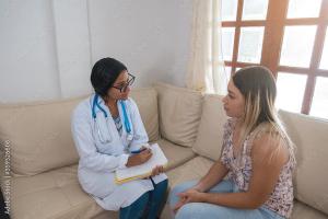 A financial counselor and a patient | Hector Pertuz for STOCK.ADOBE.COM