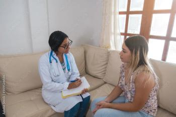 A financial counselor and a patient | Hector Pertuz for STOCK.ADOBE.COM