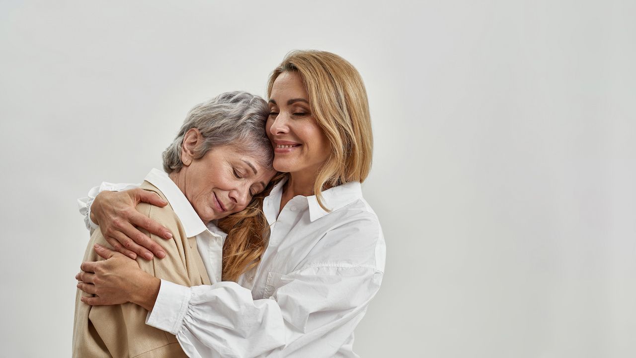 Loving adult daughter hug senior Caucasian mother: © Svitlana - stock.adobe.com