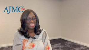 Coral Omene, MD, PhD, sitting for a vieo interview