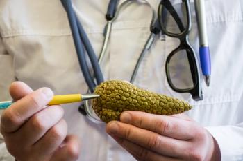 Doctor pointing to liver