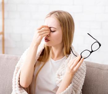Woman affected by blurry vision | Image Credit: Prostock-studio - stock.adobe.com
