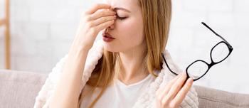 Woman affected by blurry vision | Image Credit: Prostock-studio - stock.adobe.com