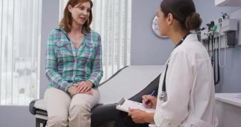 patient speaking with doctor