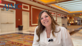 Kathi Henson, MBA, sitting for a video interview