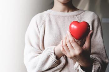 Woman holding heart. | Image credit: Ton Photographer4289 – stock.adobe.com