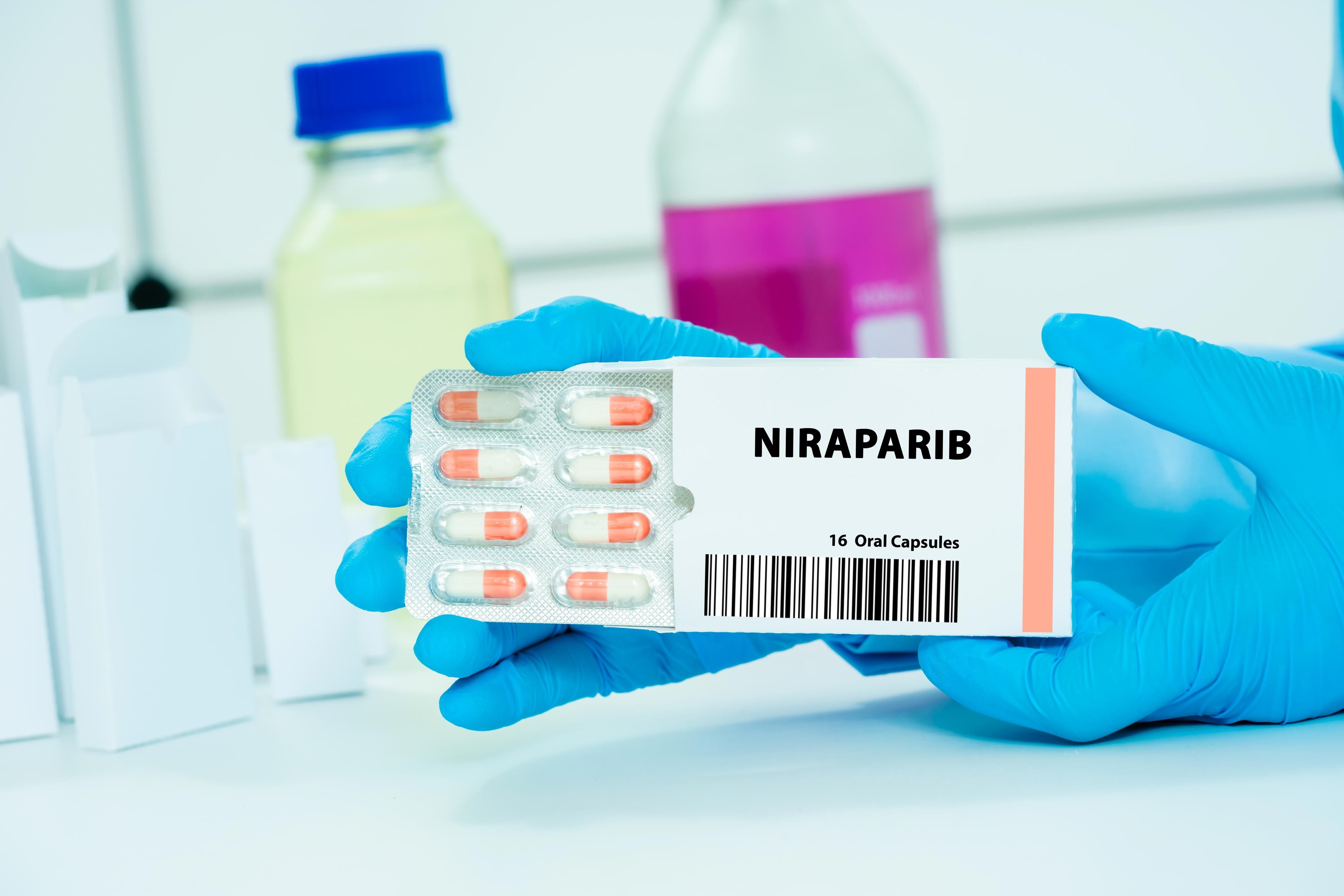 Clinician holding box of niraparib | Image Credit: luchschenF - stock.adobe.com