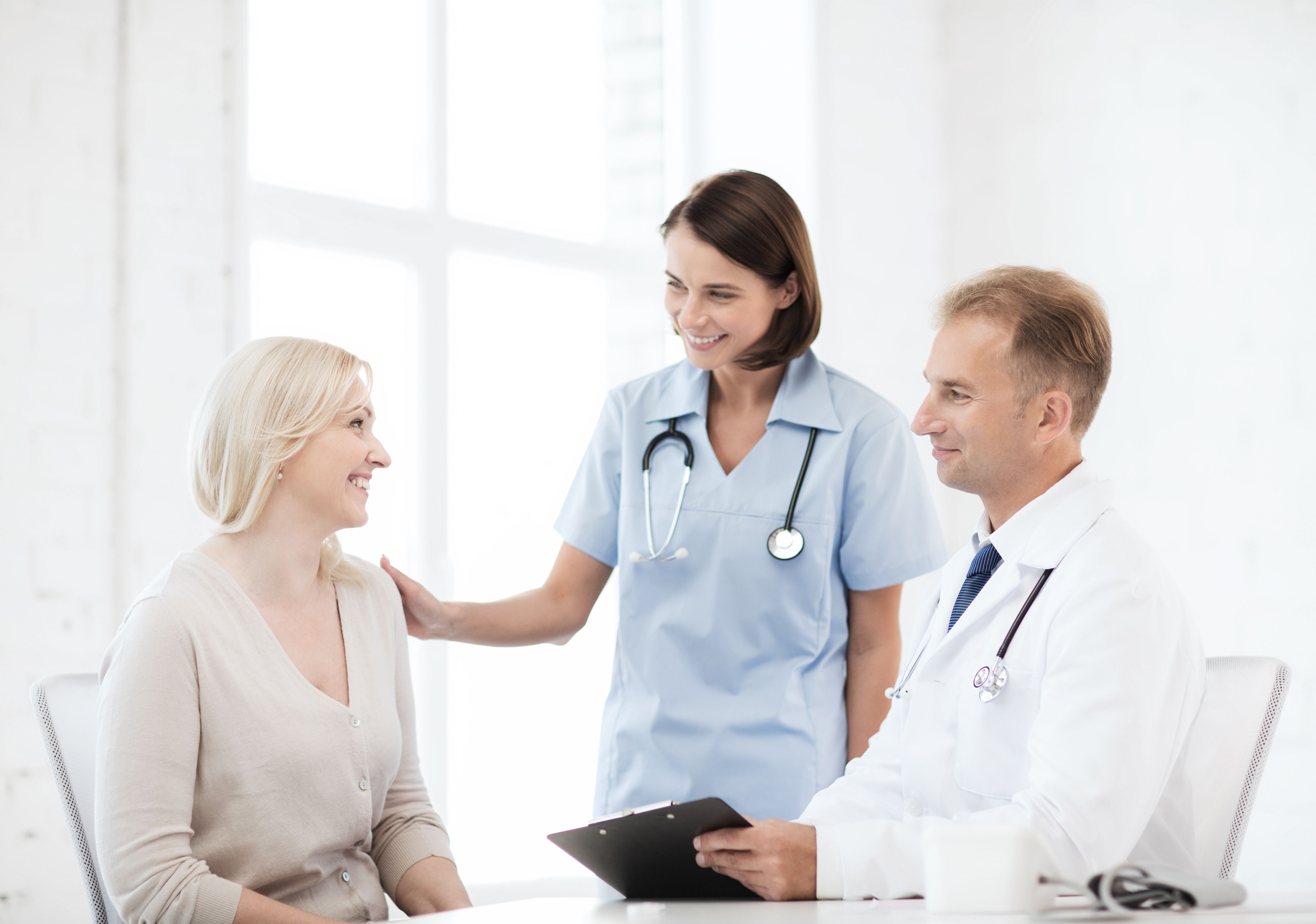 doctor and nurse with patient