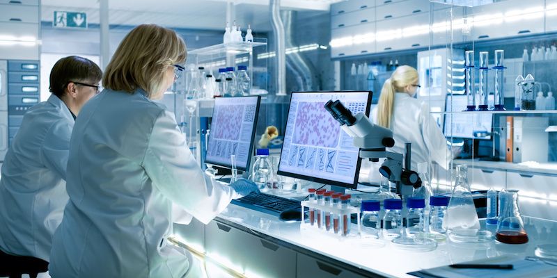 researchers in a lab