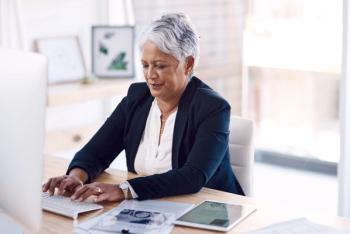 Older woman working | Image credit: Tinashe Njaku/peopleimages.com - stock.adobe.com