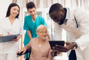 Care team talking with patient: VadimGuzhva - stock.adobe.com