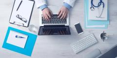 Doctor on computer