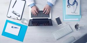 Doctor on computer
