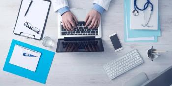 Doctor on computer