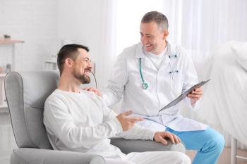 Doctor and man undergoing course of chemotherapy in clinic. Prostate cancer awareness concept | Image credit: Pixel-Shot - stock.adobe.com