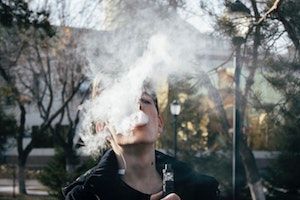 image of person vaping