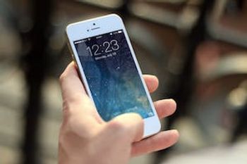 Hand holding a smartphone