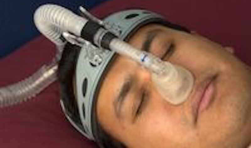 Sleeping patient on CPAP machine