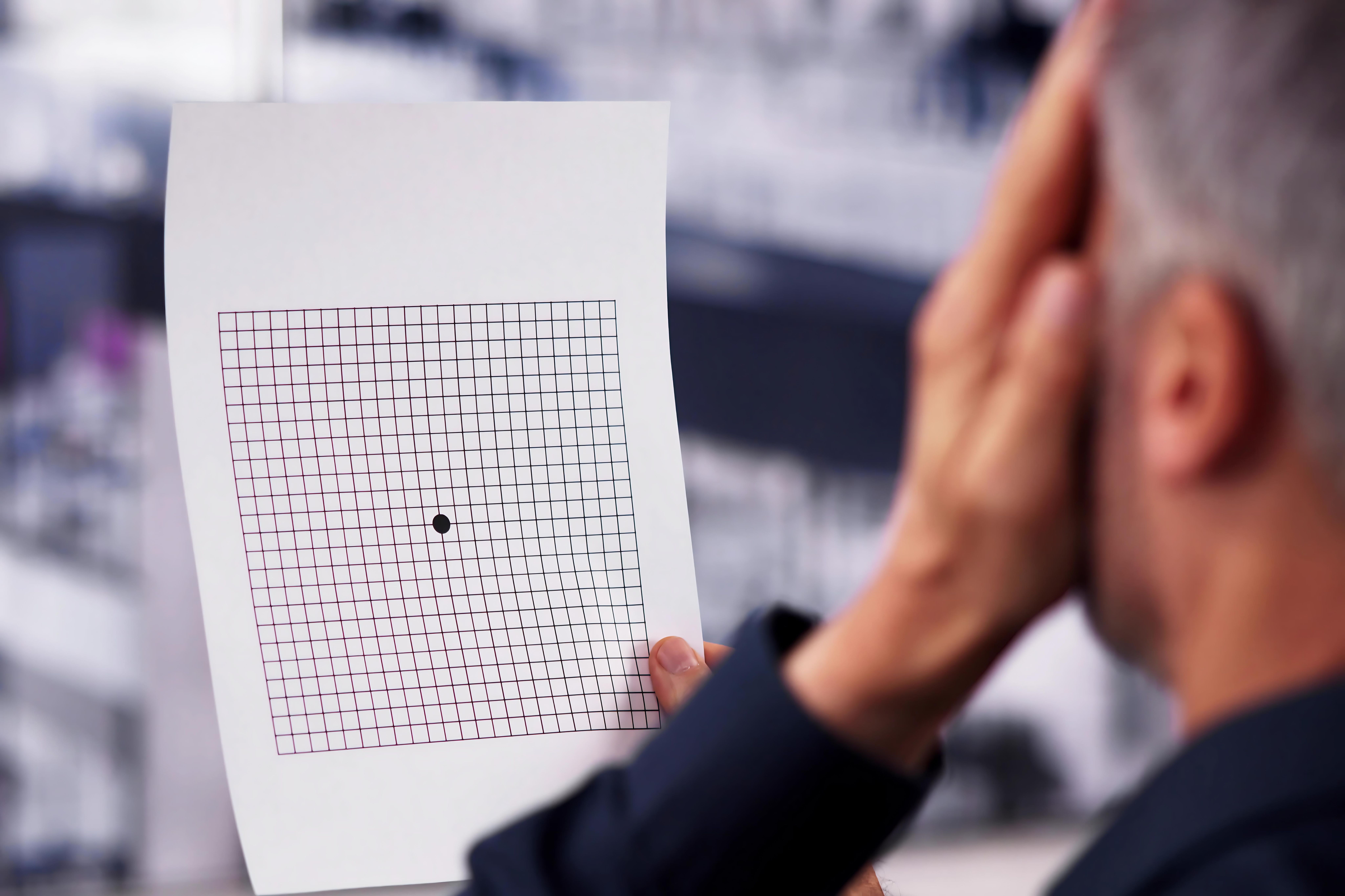Man taking AMD test | Image credit: Andrey Popov - stock.adobe.com