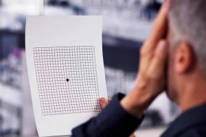 Man taking AMD test | Image credit: Andrey Popov - stock.adobe.com