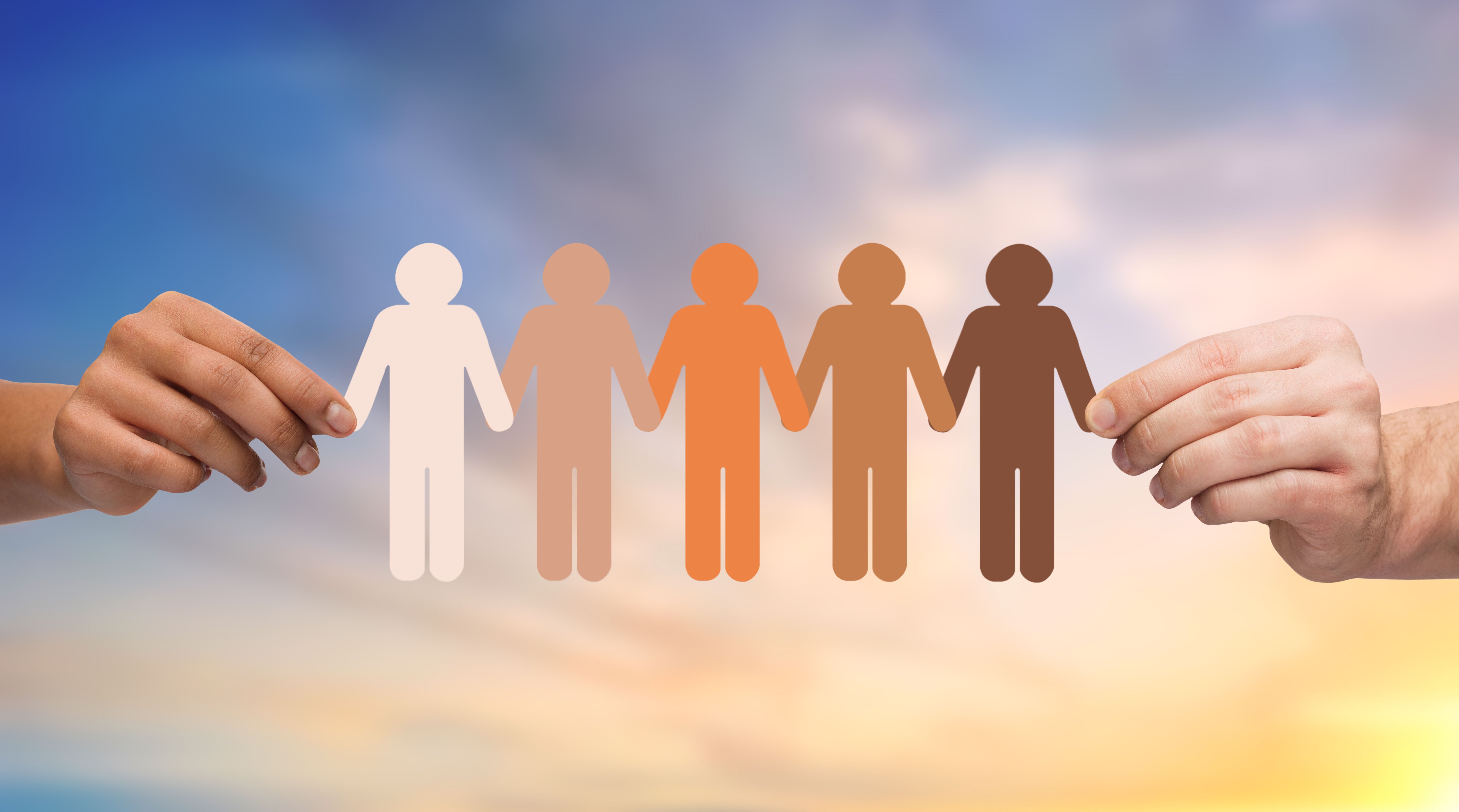 Paper cutouts of people with different skin colors | Image credit: Syda Productions – stock.adobe.com