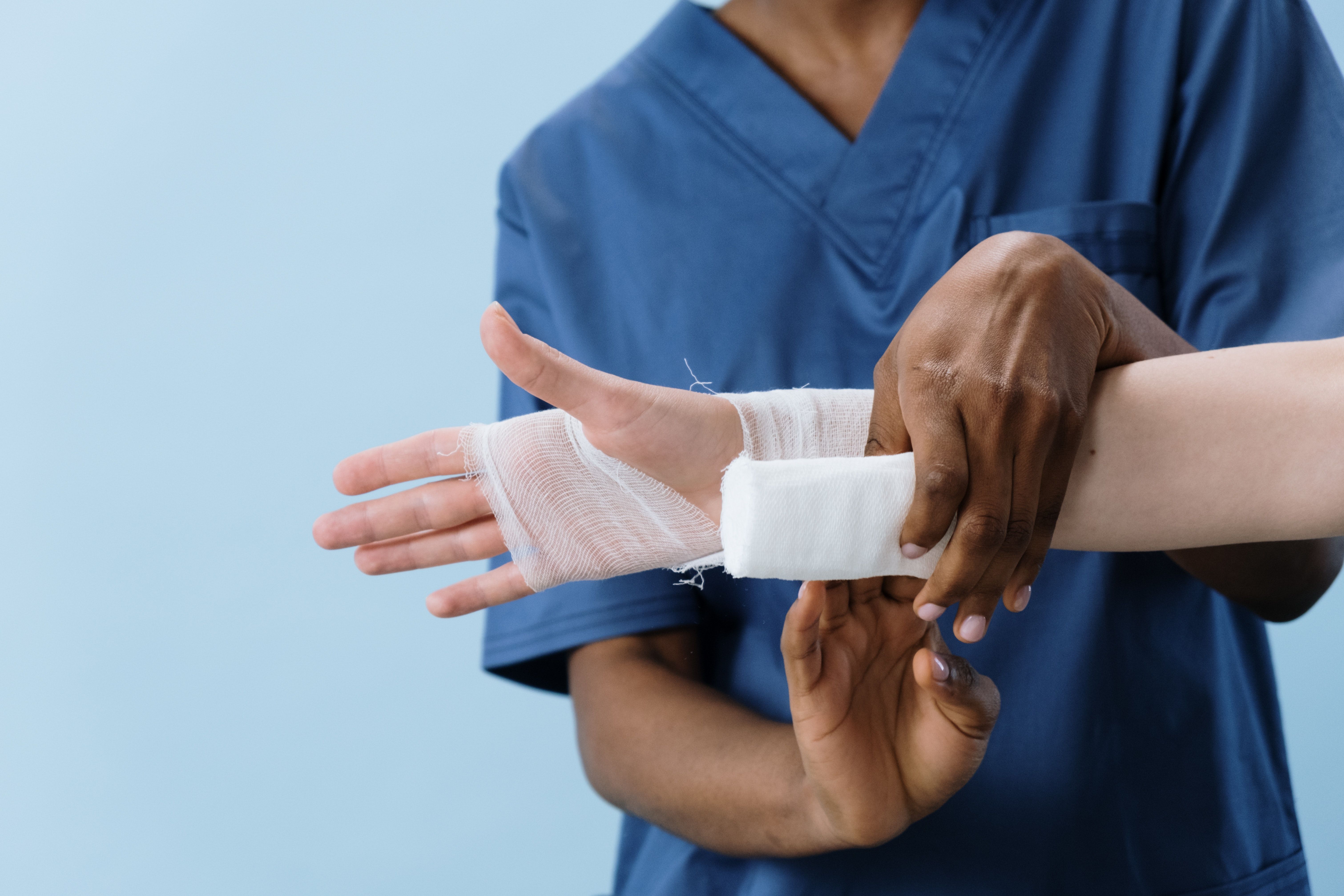 doctor wrapping someone's arm