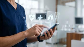 Medical Professional Using Advanced Healthcare Technology Interface on a Smartphone for Patient Data Analysis in a Modern Clinical Setting | Image credit: FahVecStudio - stock.adobe.com