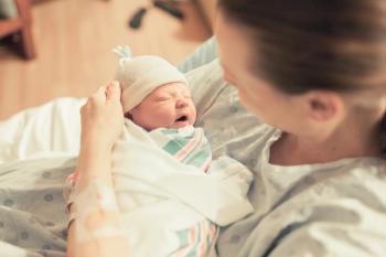 Mother holding newborn baby | Image Credit: kieferpix - stock.adobe.com