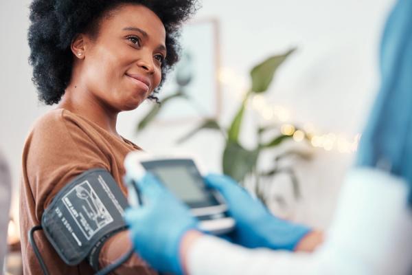 Black woman, healthcare and blood pressure machine | Image credit: T Mdlungu/peopleimages.com - stock.adobe.com