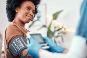 Black woman, healthcare and blood pressure machine | Image credit: T Mdlungu/peopleimages.com - stock.adobe.com