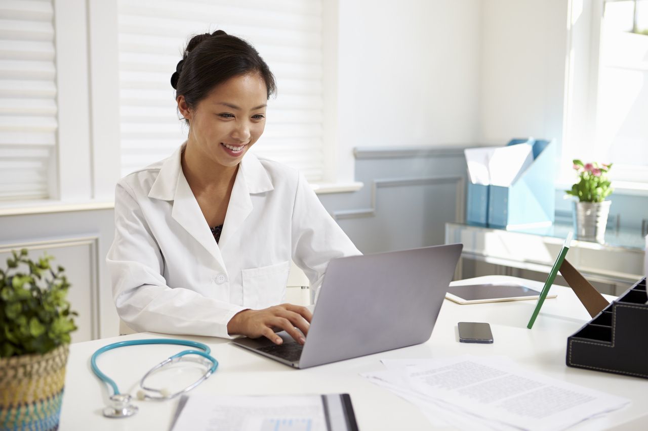 Female physician holding telehealth session