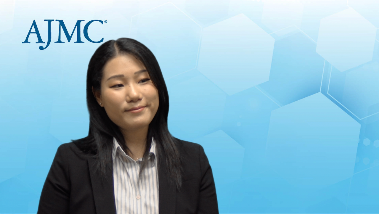 Screenshot of Yuzhi Wang, MD, in a video interview