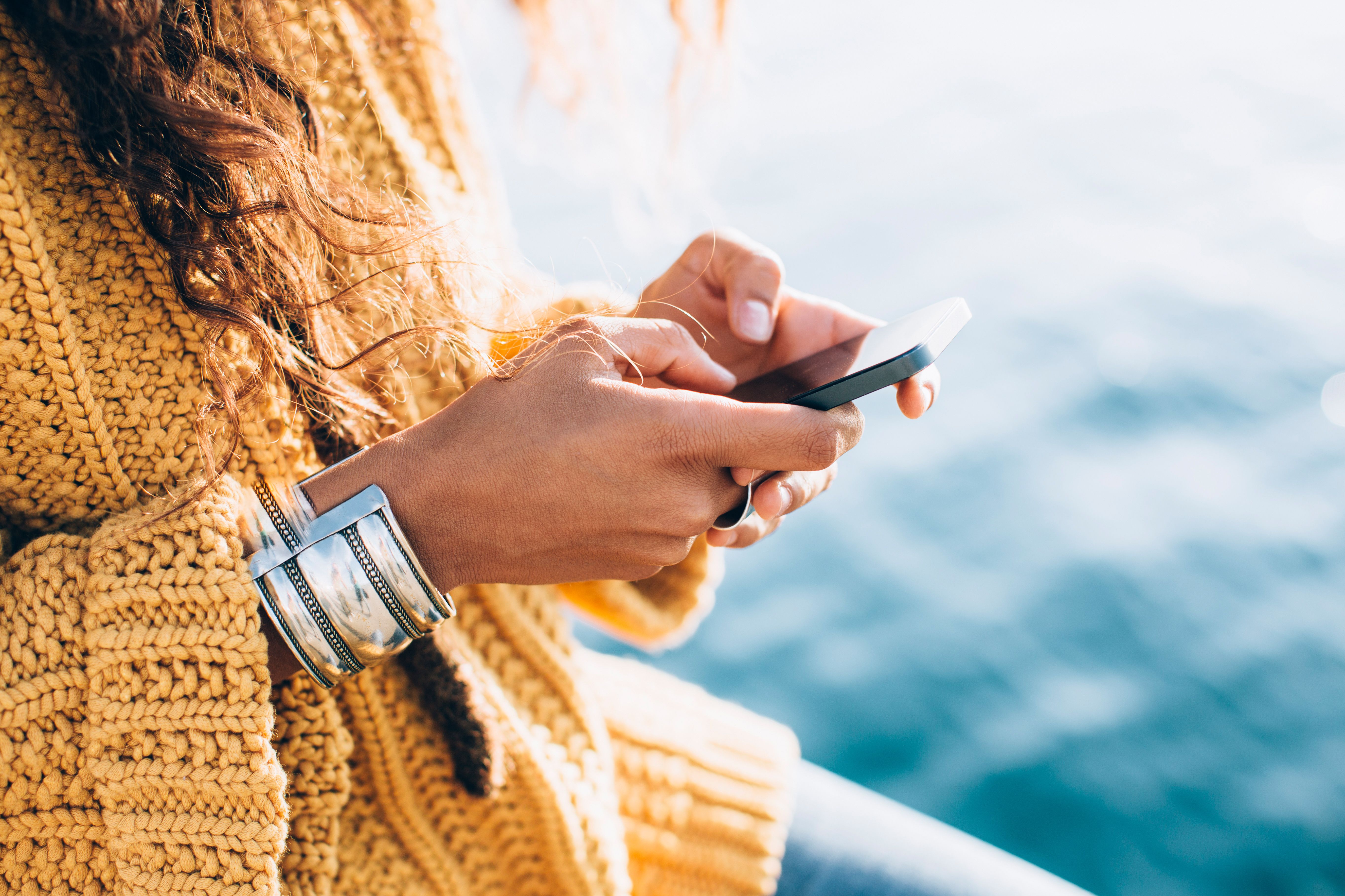 Young woman texting | Image Credit: funkyfrogstock - stock.adobe.com