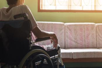 Asian senior or elderly old lady woman patient on wheelchair looking out the window so sad at home,healthy strong medical concept | Image Credit: © saelim - stock.adobe.com