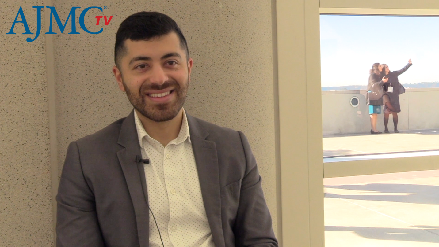 Screenshot of an interview with Amir Ali, PharmD, BCOP