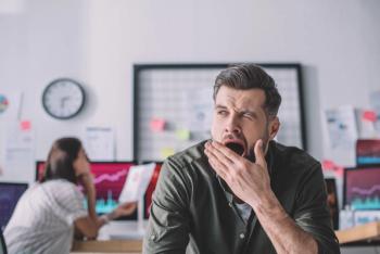  Man yawning at work | Image Credit: LIGHTFIELD STUDIOS - stock.adobe.com