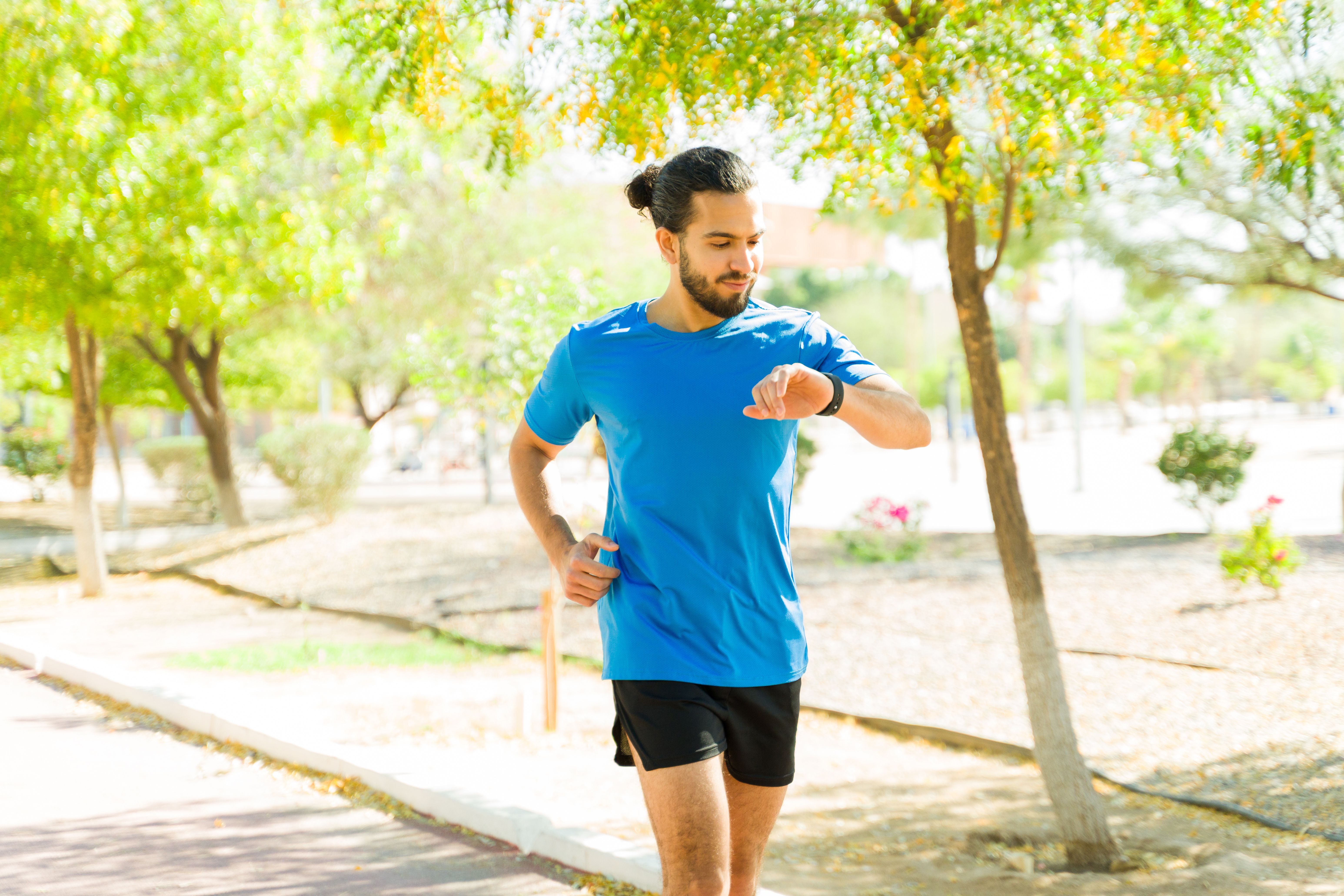 Man with smartwatch | Image credit: AntonioDiaz - stock.adobe.com